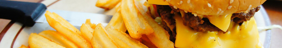 Eating American (Traditional) Burger at Black Bear Saloon restaurant in Windsor Locks, CT.